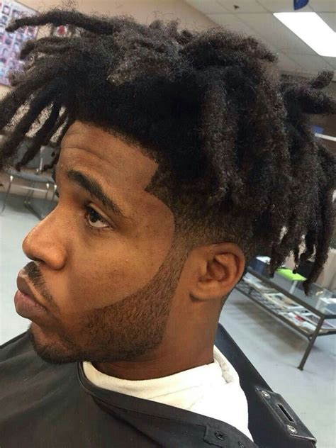 The hairdo that I am specifically talking about is a high top box fade. . High top fade freeform dreads
